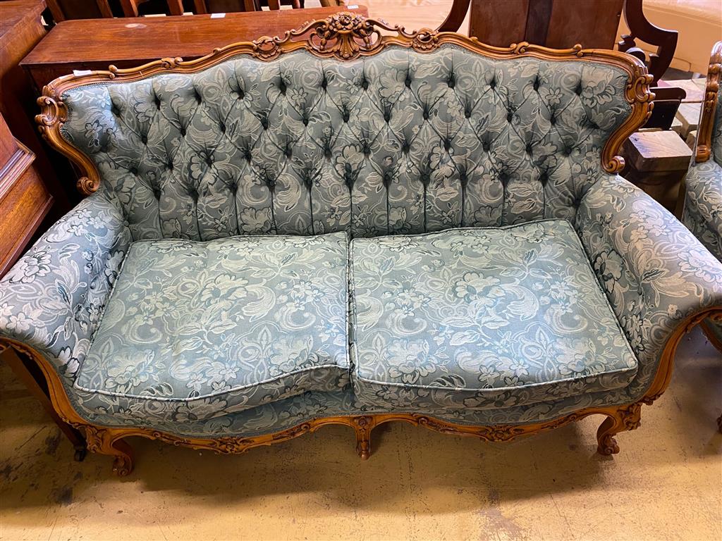 Louis XV style carved walnut framed buttoned two seater settee, length 154cm, depth 78cm, height 90cm and a matching armchair